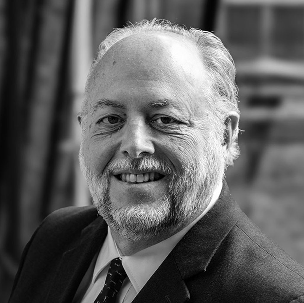 Smiling older man in suit portrait