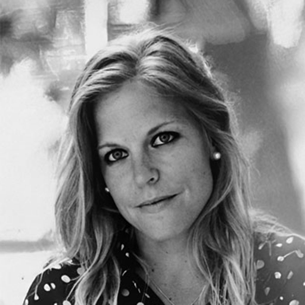 Black-and-white portrait of woman with pearl earrings