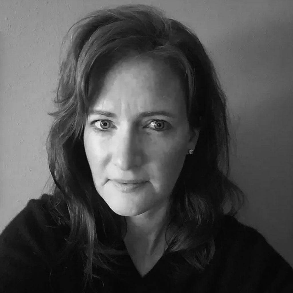 Black-and-white portrait of woman with serious expression