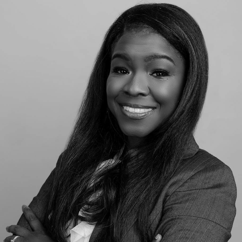 Professional woman smiling in business headshot