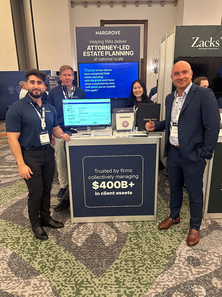 Team at estate planning trade show booth