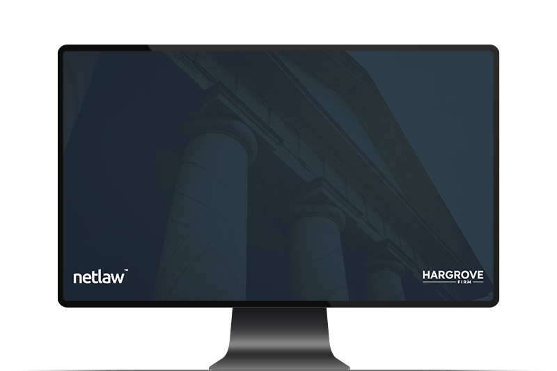 Computer monitor displaying law firm branding and courthouse columns