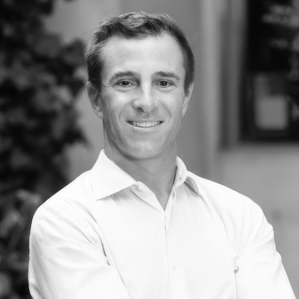 Smiling man in button-down shirt portrait
