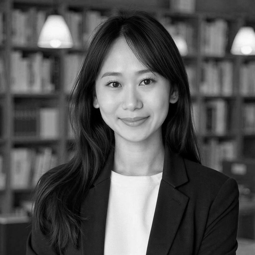 Professional woman smiling in library setting