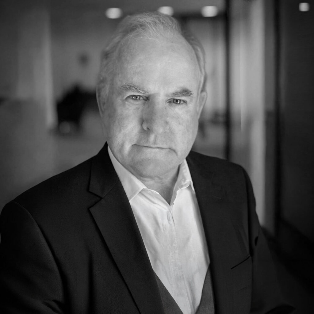 Black-and-white portrait of older man in suit