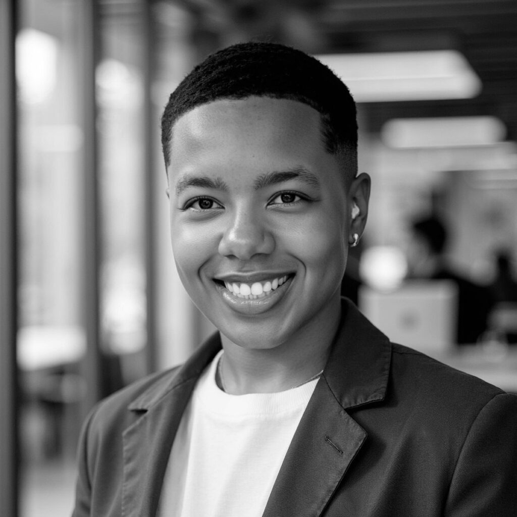 Black-and-white professional headshot of Ettienna Gallaher