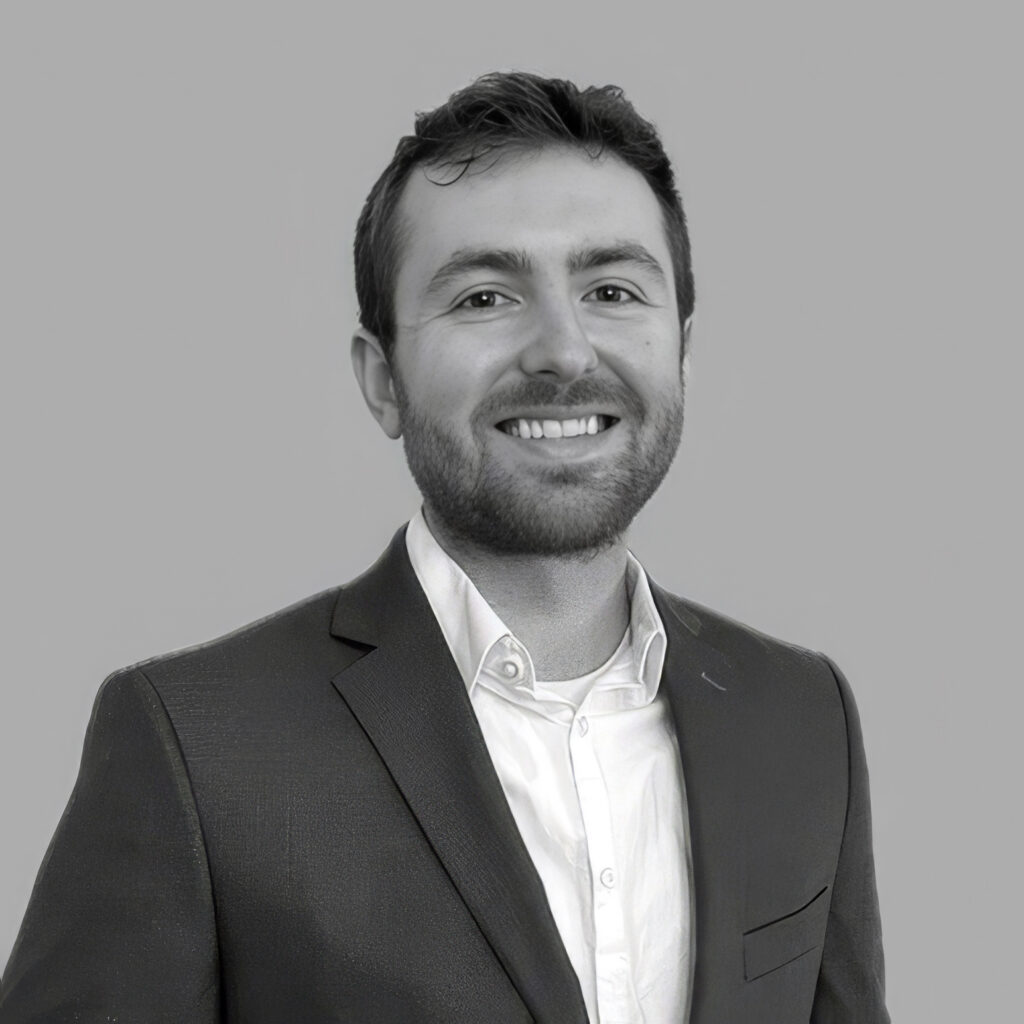 Black-and-white professional headshot of Kyle Moskowitz