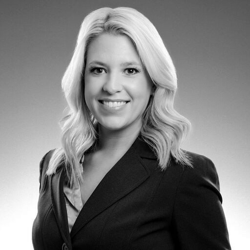 Black-and-white professional headshot of Mandy Mills