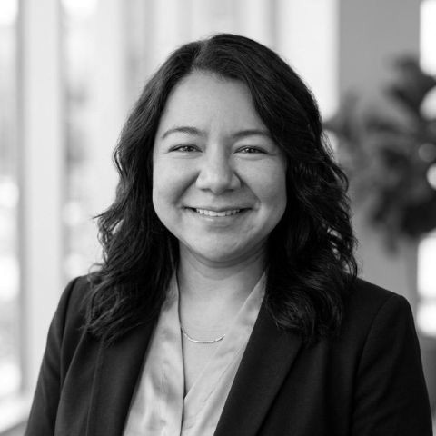 Black-and-white professional headshot of Sam Vazquez