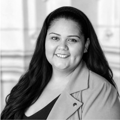 Black-and-white professional headshot of Tania Gomez